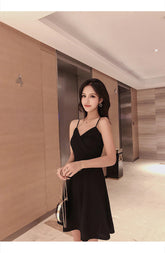 Schwarzes elegantes sexy schmales Spaghetti-Kleid